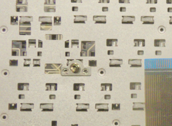 Little pads for screws to hold on, which should be removed if the
keyboard is to be installed on an UX32VD